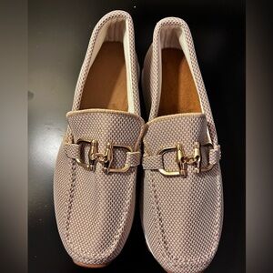 Size 9 Brand new slip on very comfortable shoes.  ( fit similar to Hey Dudes)